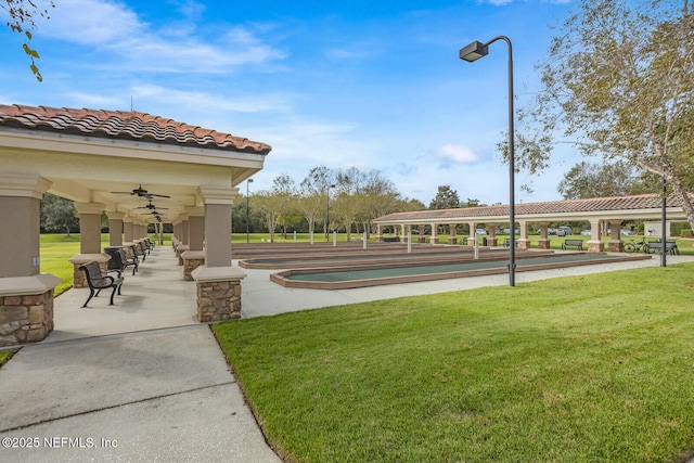 view of home's community featuring a yard