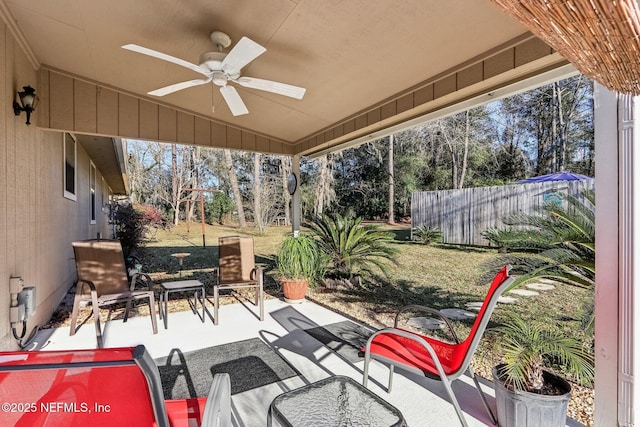 view of patio featuring ceiling fan