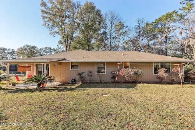 single story home featuring a patio and a front yard