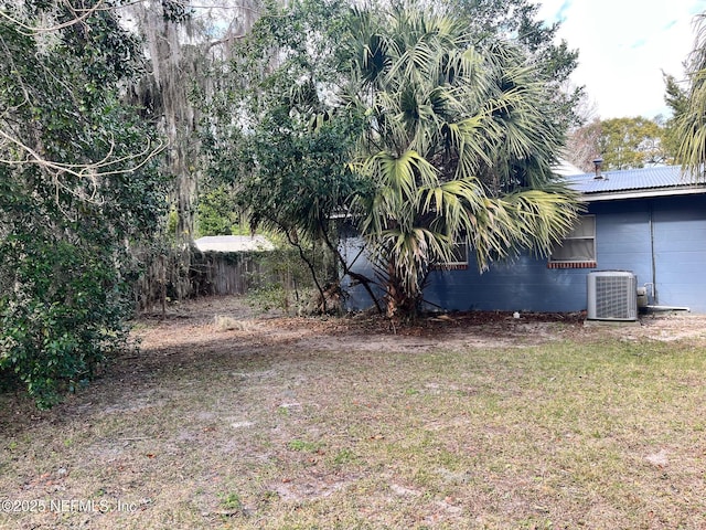 view of yard featuring central AC unit