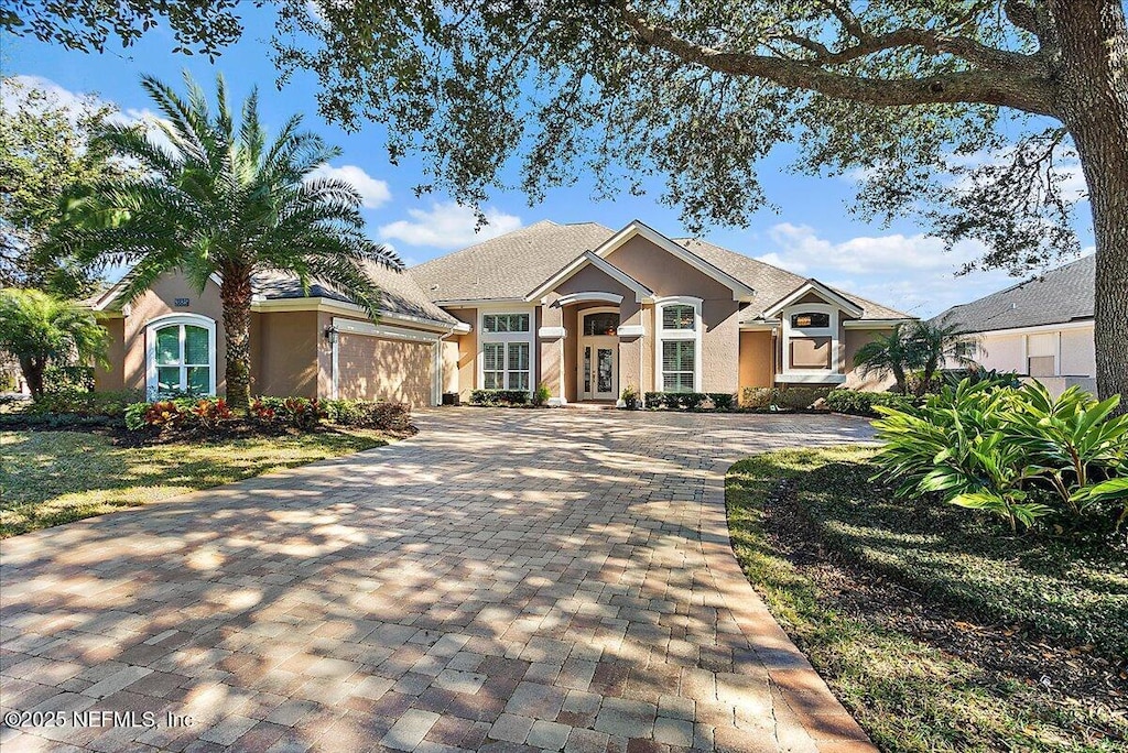 view of front of house with a garage