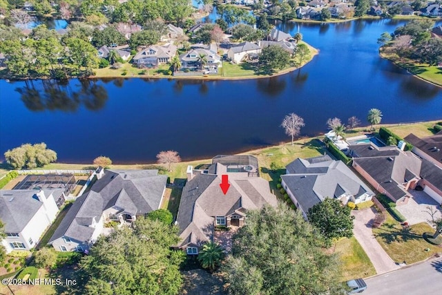 drone / aerial view with a water view