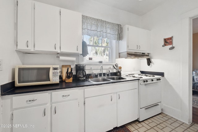 kitchen with sink, white cabinets, exhaust hood, and white appliances