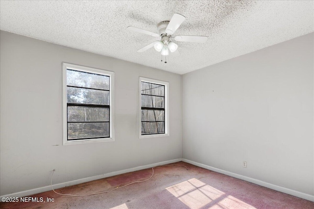 unfurnished room with light carpet, a textured ceiling, and ceiling fan