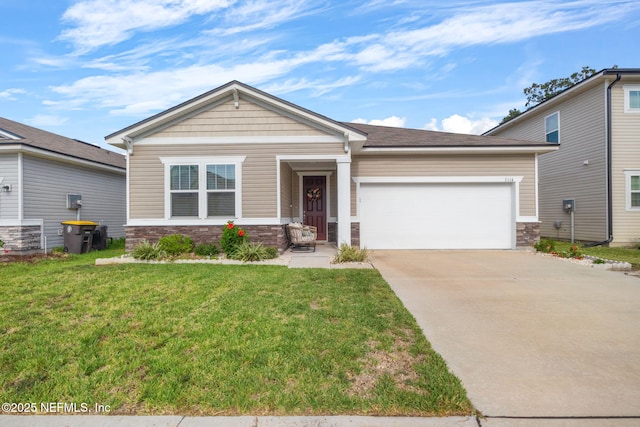 craftsman inspired home featuring a garage and a front lawn