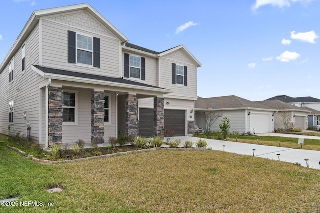 view of front facade with a front yard and a garage