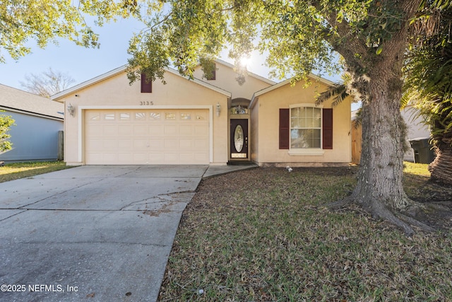 view of front of home with a garage