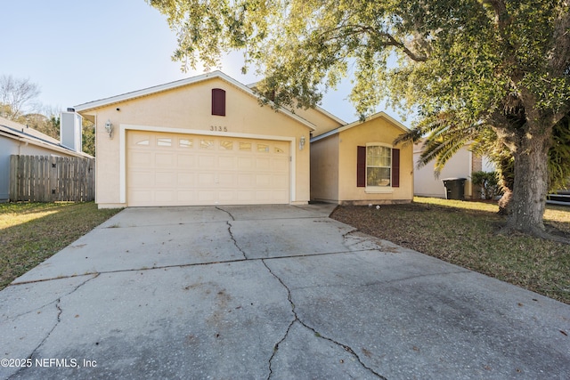 ranch-style home with a garage