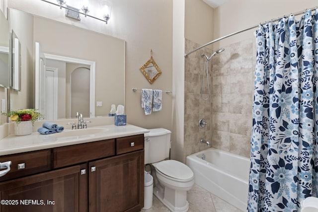 full bathroom featuring tile patterned flooring, vanity, shower / bath combo, and toilet