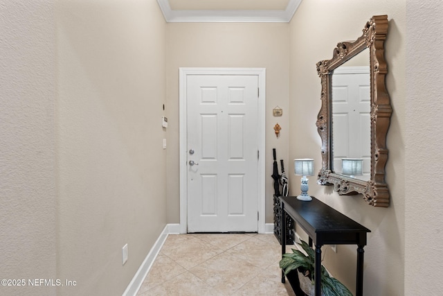 tiled foyer with crown molding