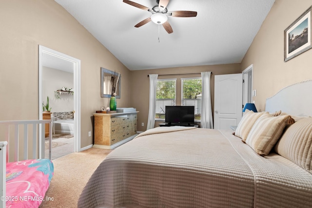 bedroom with lofted ceiling, light colored carpet, and ceiling fan