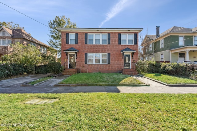 view of front facade with a front yard