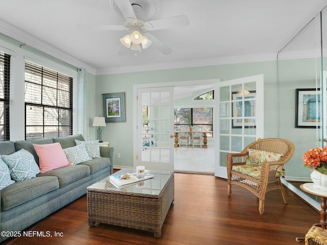 living room featuring ceiling fan, crown molding, and dark hardwood / wood-style floors