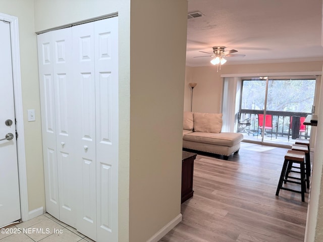 hall featuring light hardwood / wood-style floors