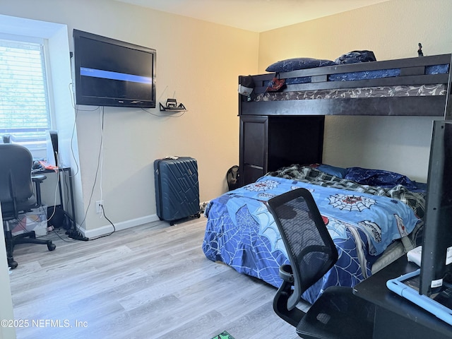 bedroom featuring light hardwood / wood-style floors