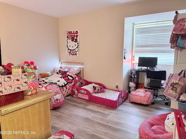 bedroom featuring hardwood / wood-style flooring