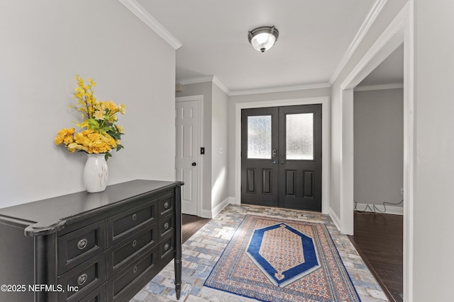 entryway featuring wood-type flooring, crown molding, and french doors