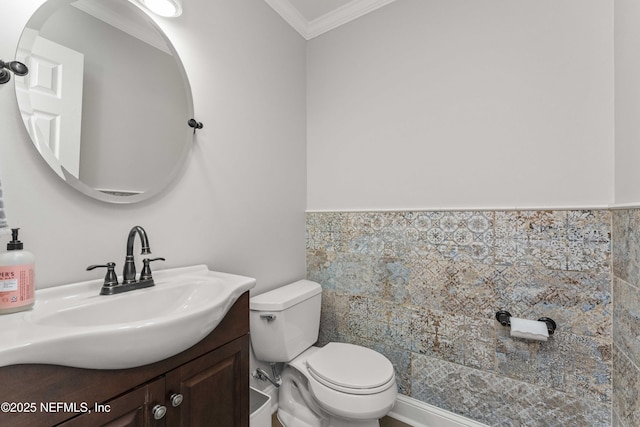 bathroom featuring vanity, toilet, and crown molding