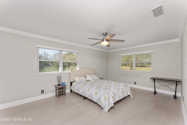 bedroom featuring ceiling fan and crown molding