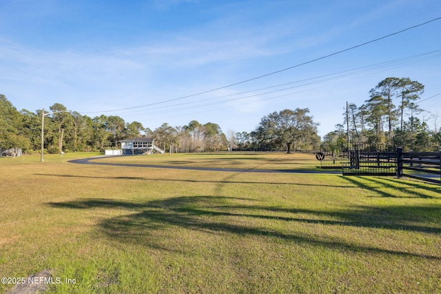 view of property's community featuring a yard