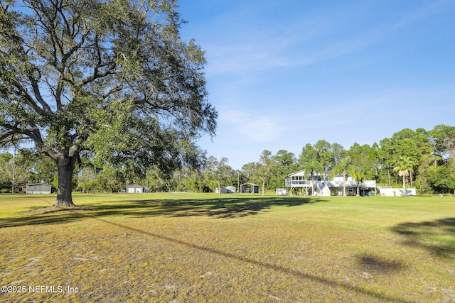 surrounding community with a lawn