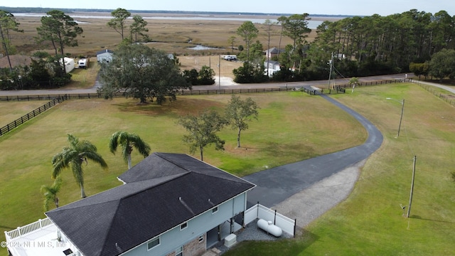 birds eye view of property with a rural view