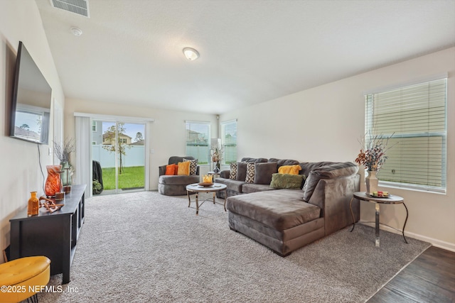 living room with dark hardwood / wood-style floors