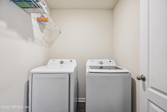 washroom featuring washer and dryer