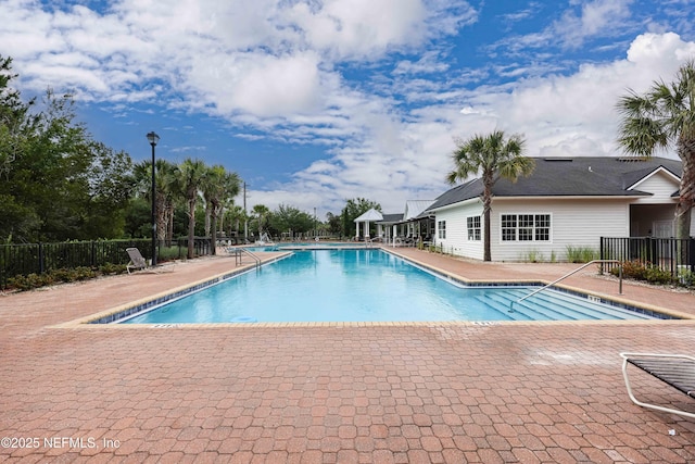 view of pool featuring a patio