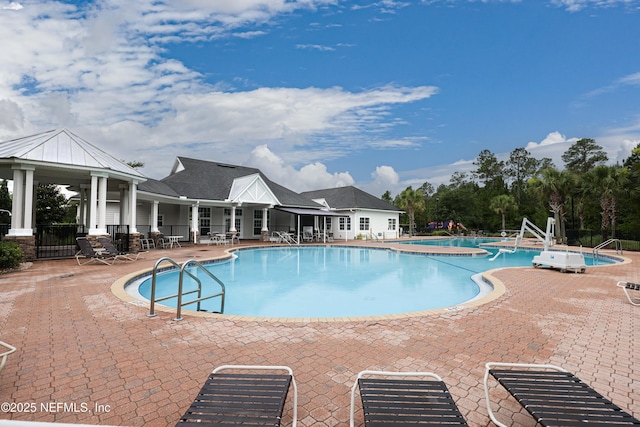 view of pool featuring a patio