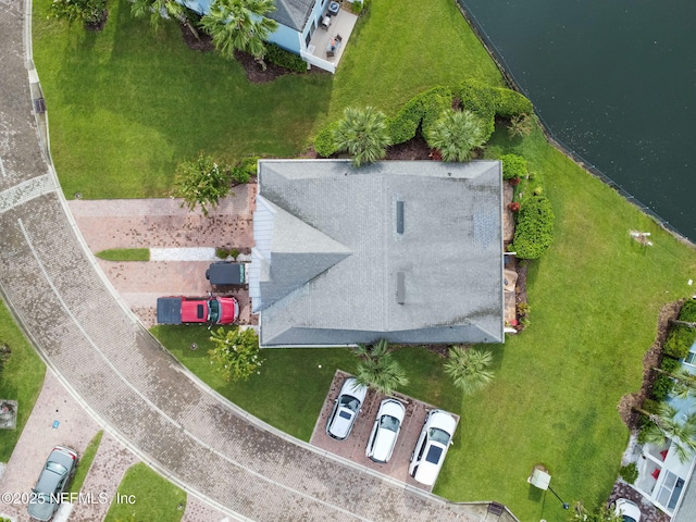 drone / aerial view with a water view