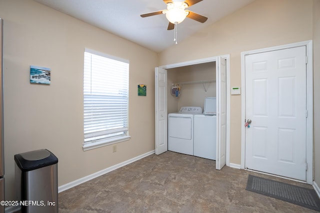 laundry room featuring laundry area, ceiling fan, baseboards, and washing machine and clothes dryer