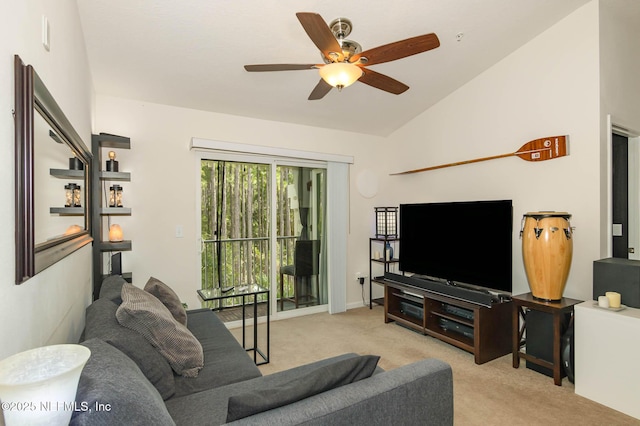 living room with ceiling fan, light carpet, and vaulted ceiling