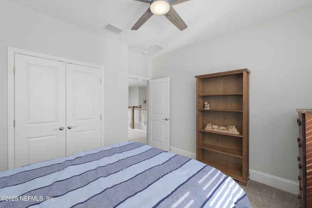 unfurnished bedroom featuring carpet flooring, ceiling fan, and a closet