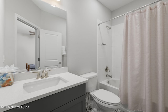 full bathroom with toilet, shower / tub combo with curtain, and vanity