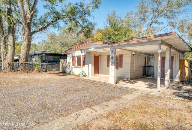 view of front of house with a carport