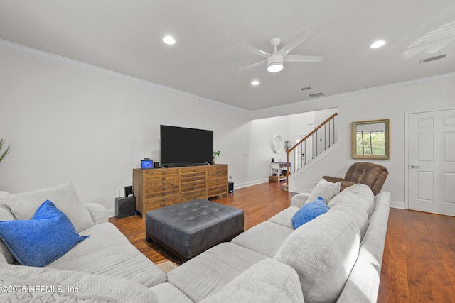 living room with ceiling fan, hardwood / wood-style floors, and ornamental molding