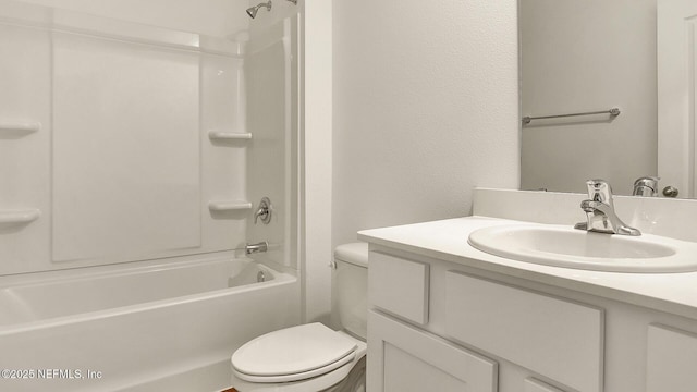 full bathroom with vanity, shower / bath combination, and toilet