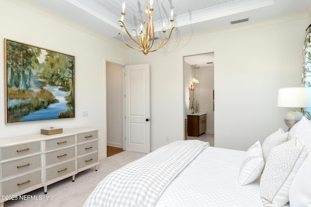 carpeted bedroom featuring an inviting chandelier and ornamental molding