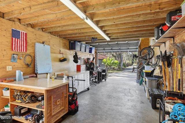 garage with a workshop area