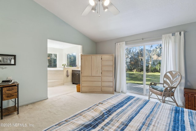 carpeted bedroom featuring access to outside, connected bathroom, ceiling fan, and vaulted ceiling