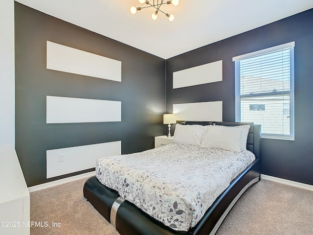 carpeted bedroom featuring multiple windows and an inviting chandelier