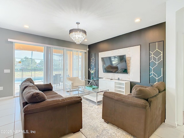 living room with light tile patterned floors and a notable chandelier