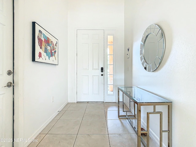 foyer entrance featuring light tile patterned floors