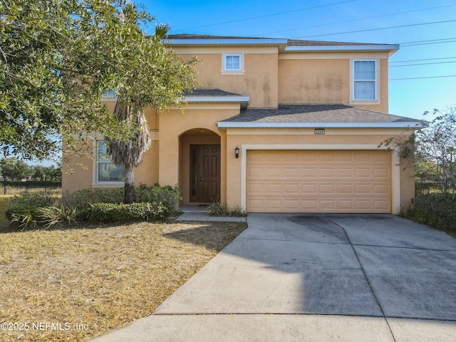 view of front of home with a garage