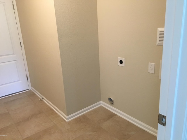 laundry room featuring hookup for an electric dryer