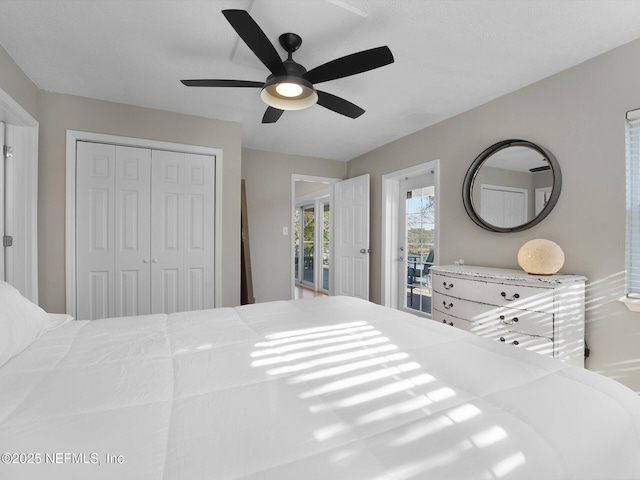 bedroom featuring ceiling fan and a closet