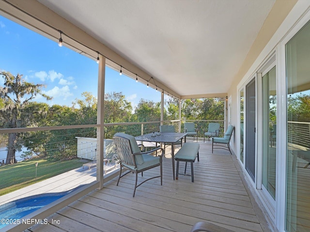 sunroom / solarium featuring a wealth of natural light