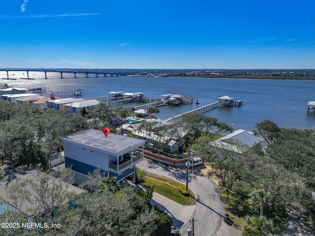 birds eye view of property featuring a water view