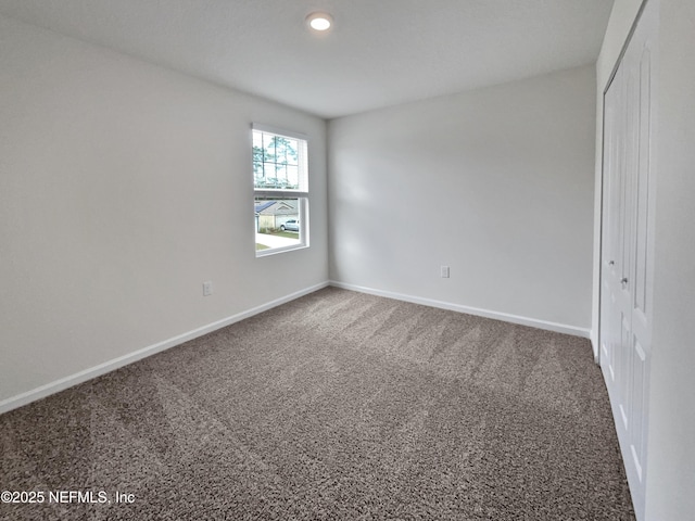 view of carpeted spare room